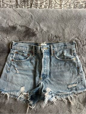 Agolde Light Blue Distressed Denim Cutoff Shorts